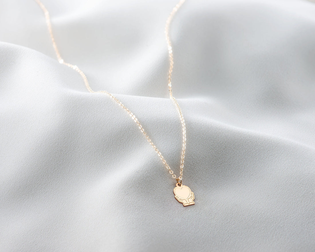 Heart In Hands Necklace