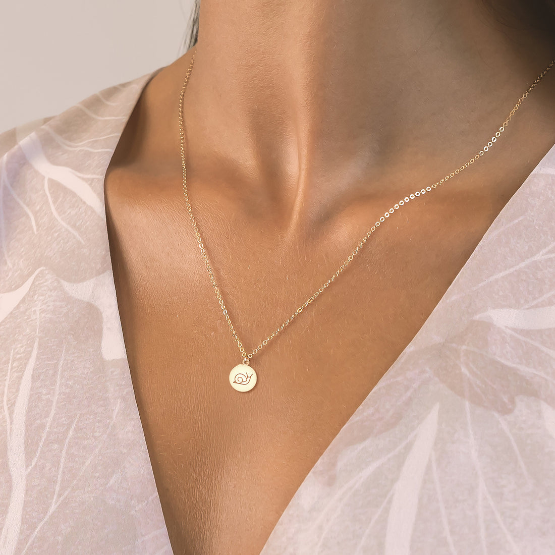 Snail Disc Gold