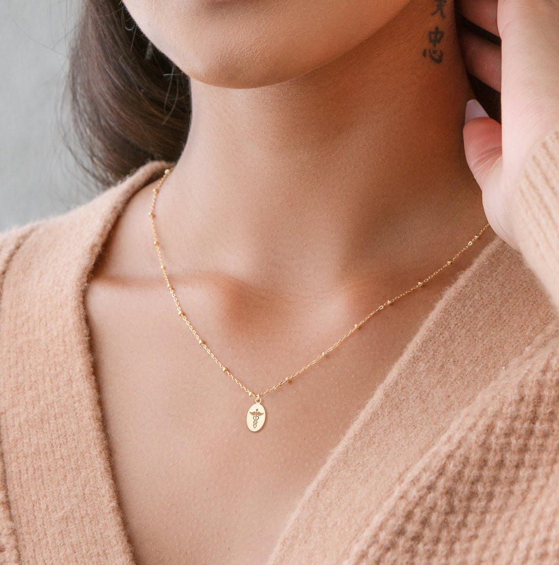 Caduceus Oval Disc Necklace