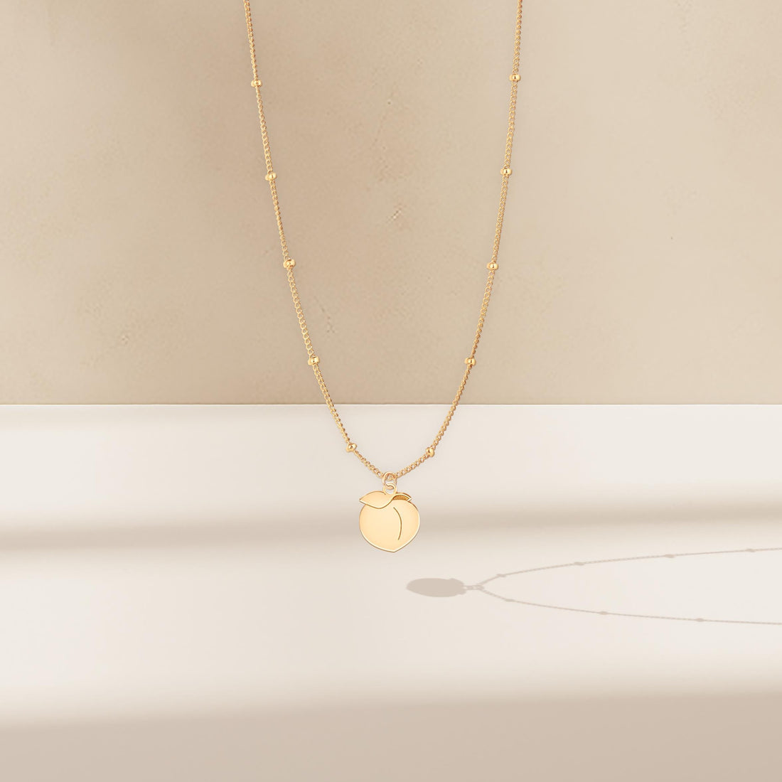Peach Pendant Beady Necklace