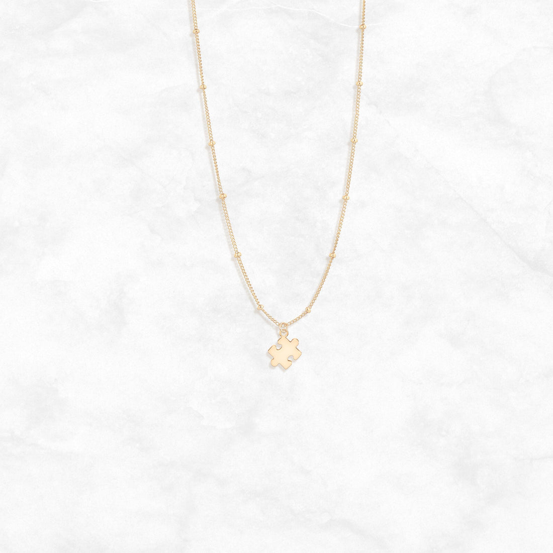 Puzzle Piece Pendant Beady Necklace