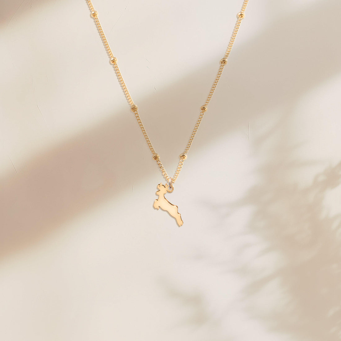 Reindeer Pendant Beady Necklace