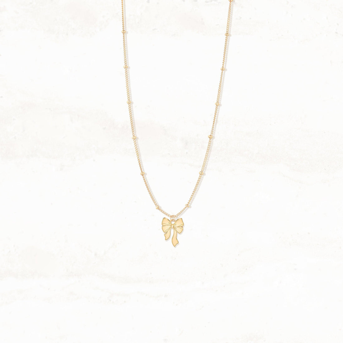 Ribbon Bow Pendant Beady Necklace