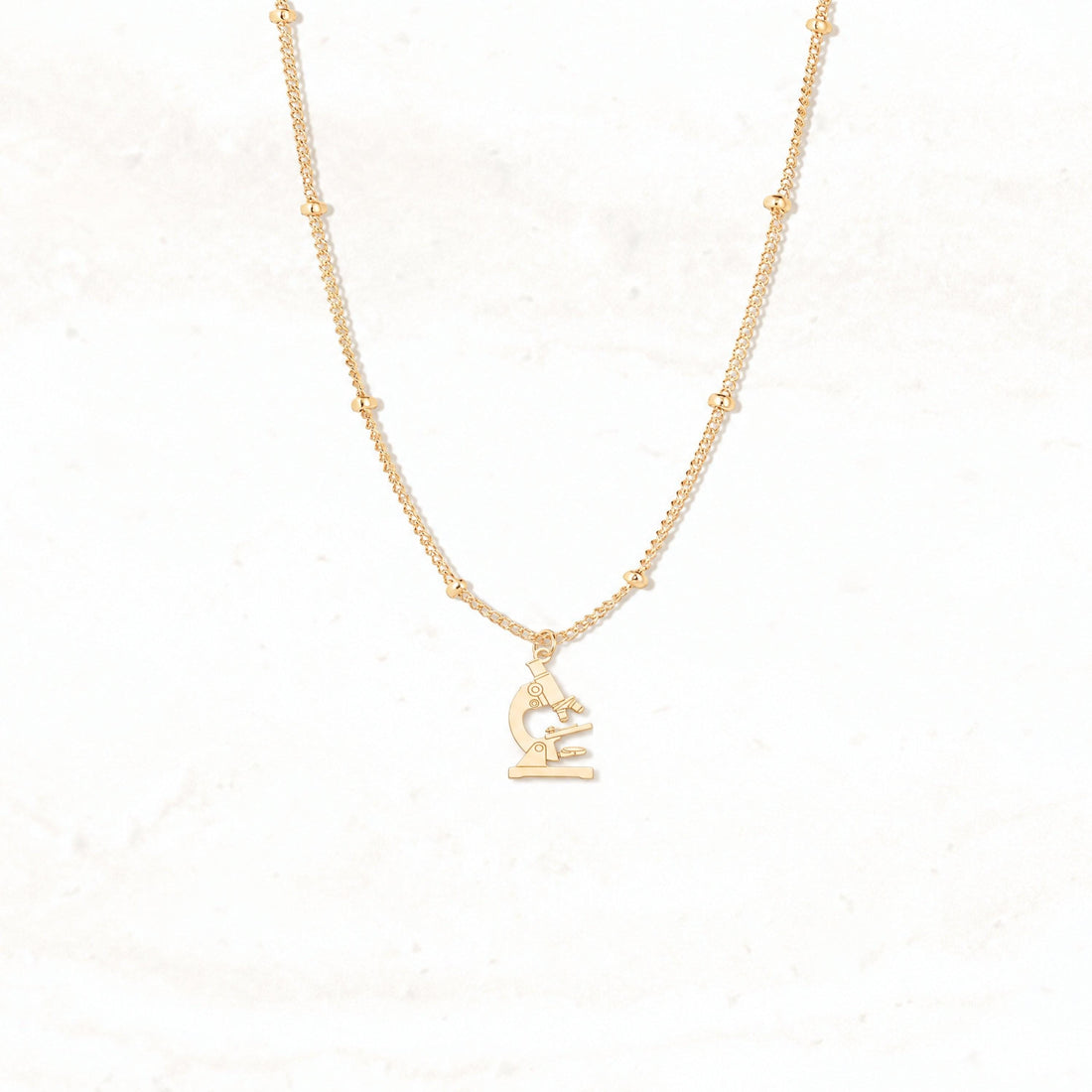 Curved Arm Microscope Charm Necklace