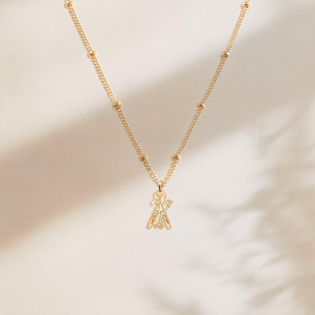 Crossed Skis Charm Necklace