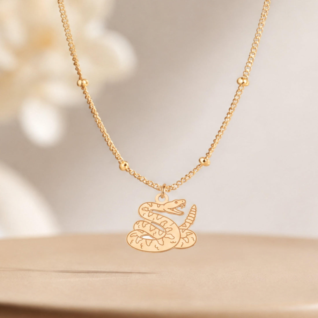 Coiled Snake Charm Necklace