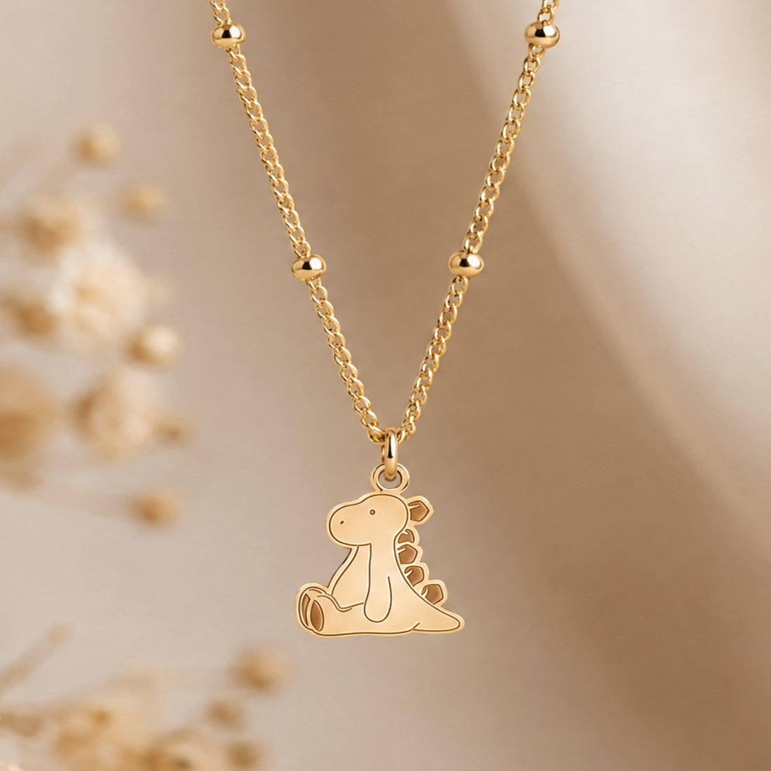 Sitting Baby Dinosaur Charm Necklace