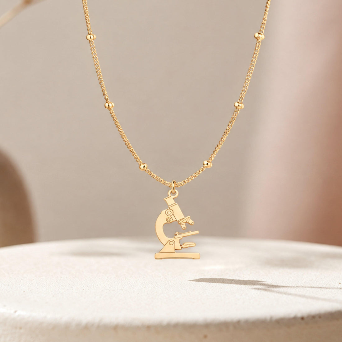 Curved Arm Microscope Charm Necklace
