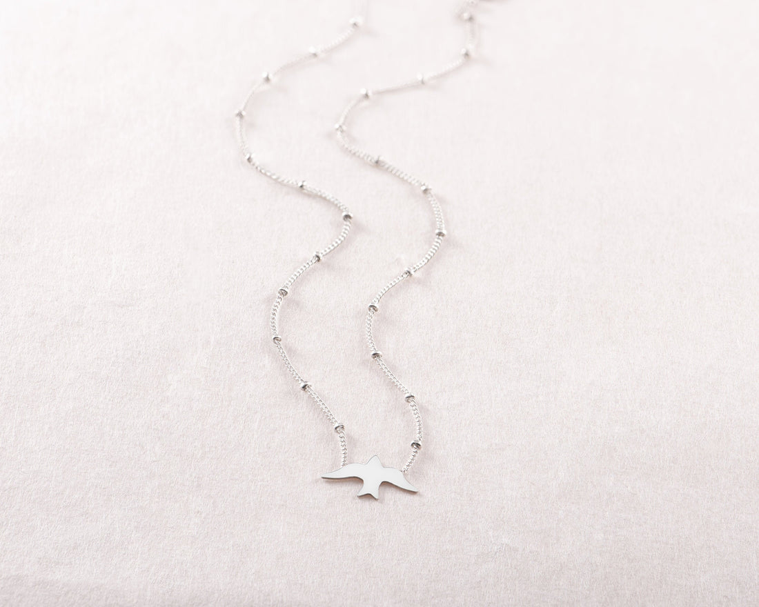 Dove Silhouette Pendant Beady Necklace