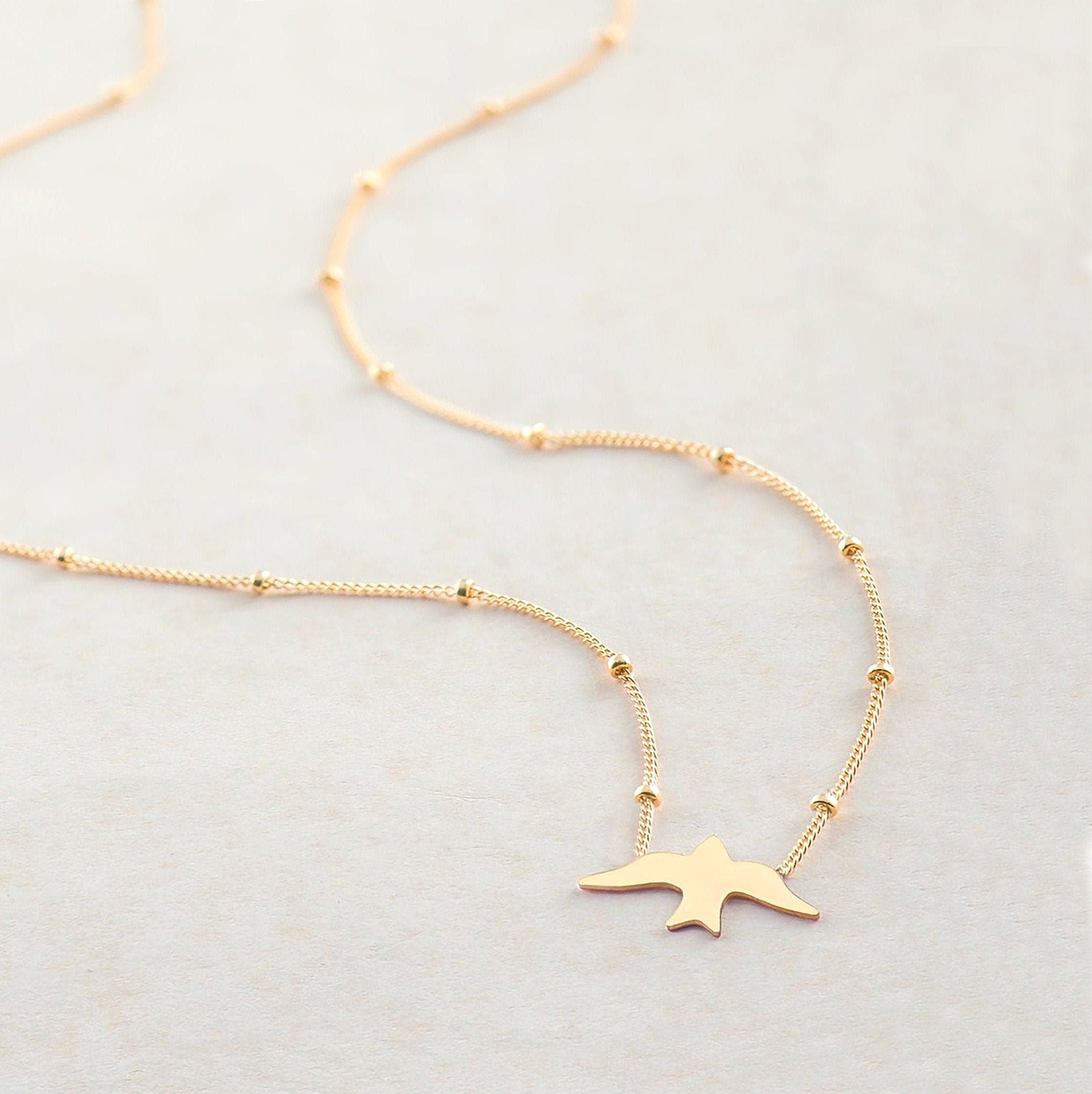 Dove Silhouette Pendant Beady Necklace