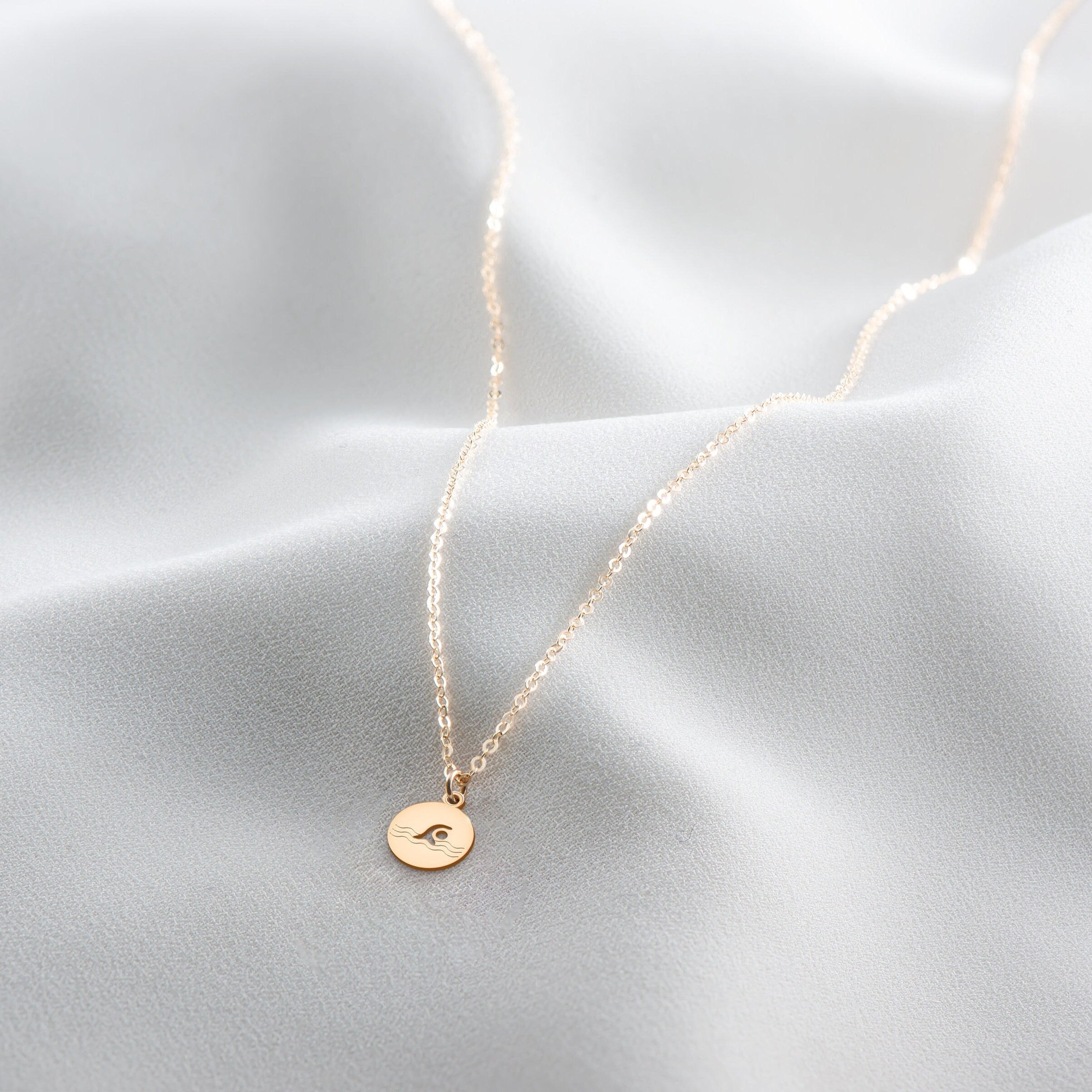 Swimmer Cutout Disc Necklace