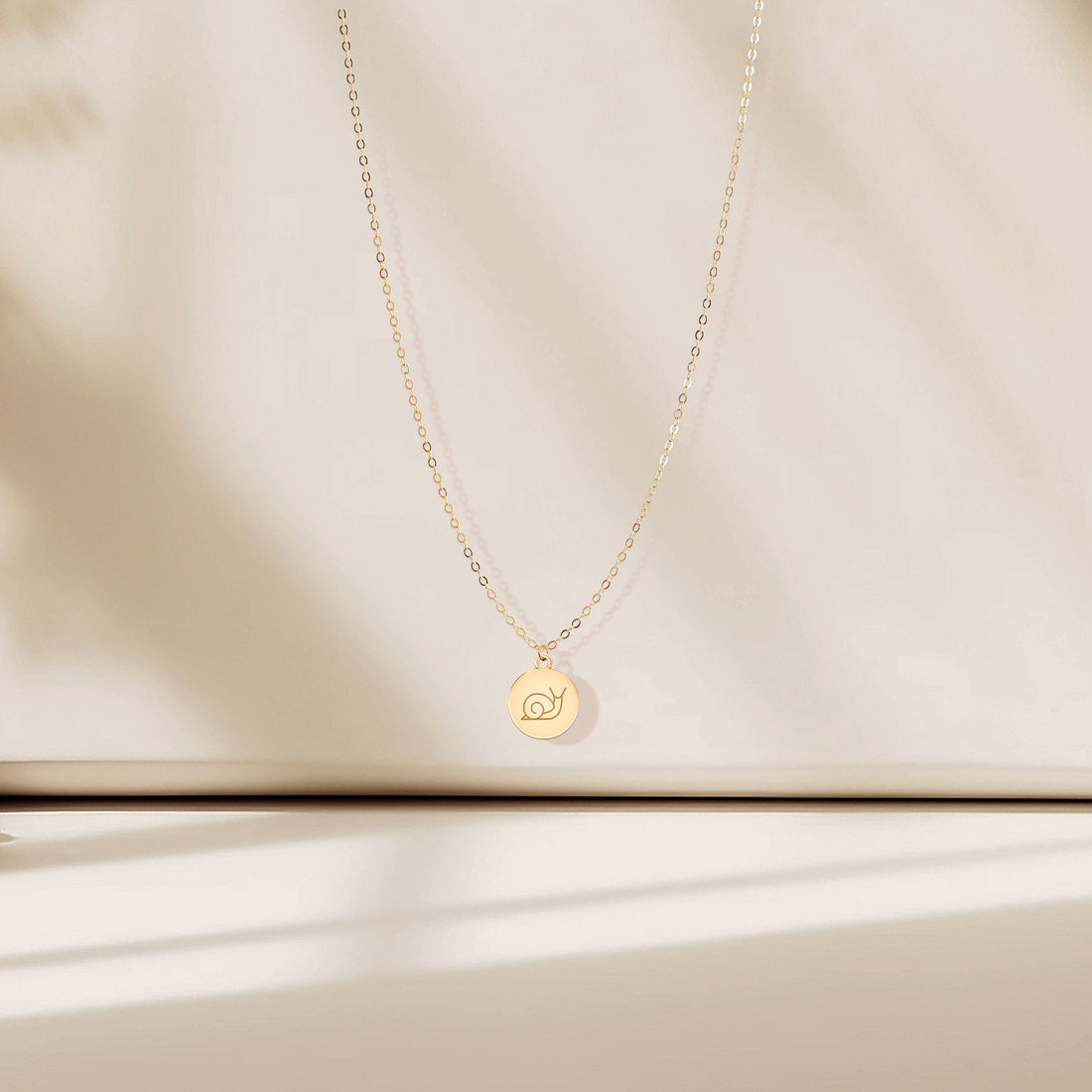Snail Disc Gold