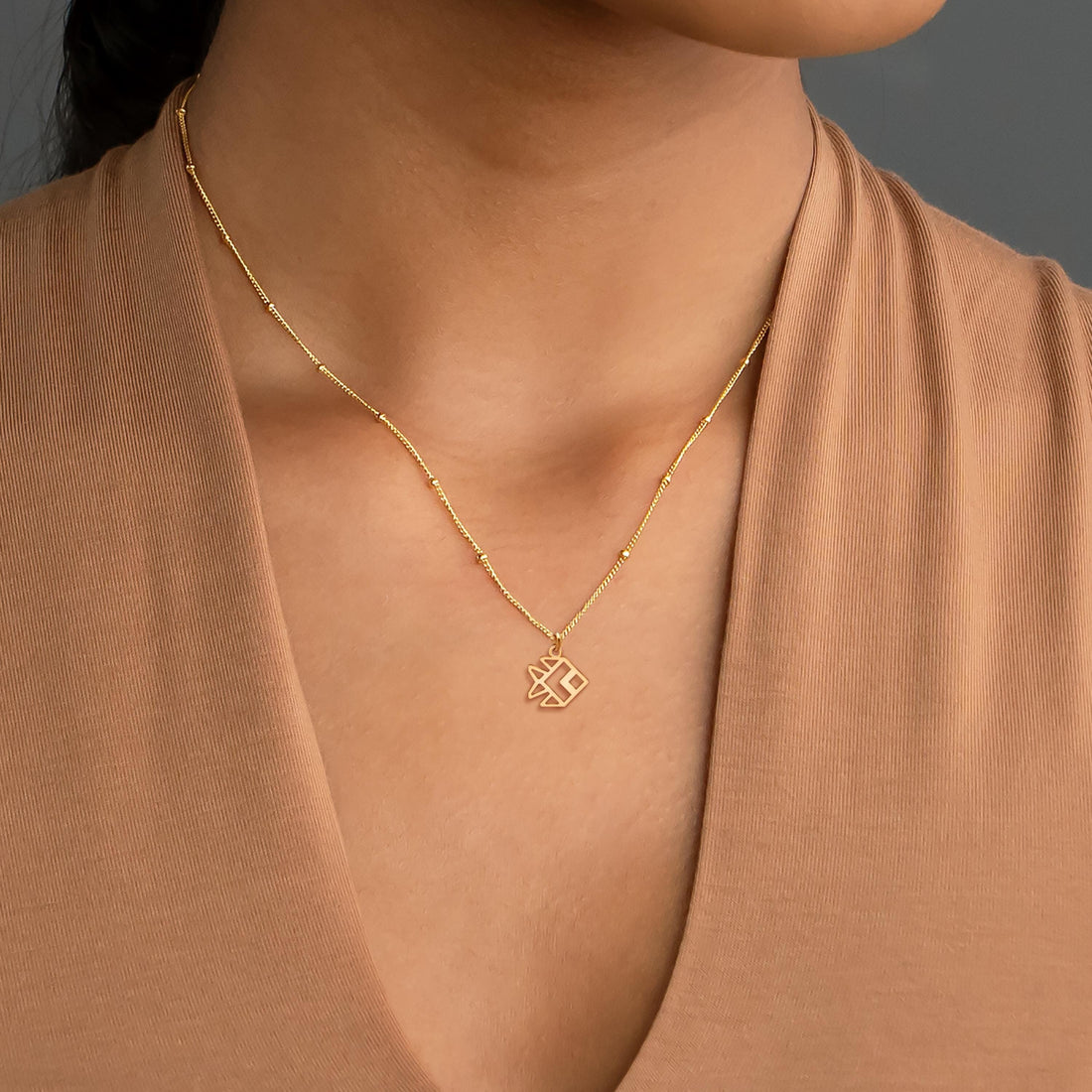 Geometric Fish Pendant Beady Necklace