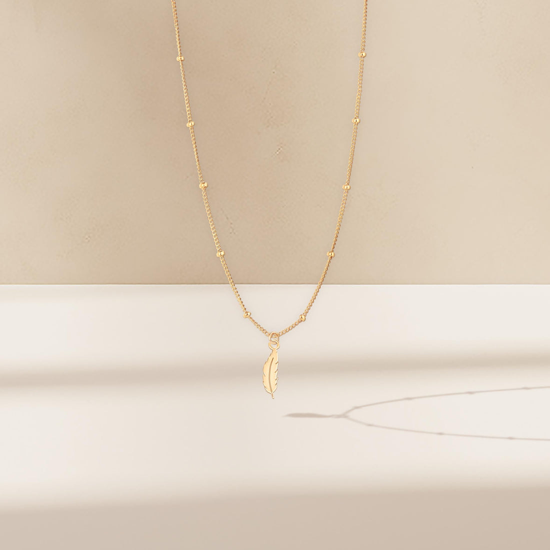 Feather Pendant Beady Necklace