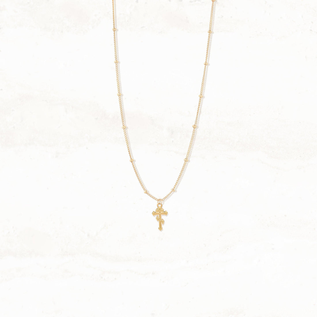 Ornate Cross Pendant Beady Necklace