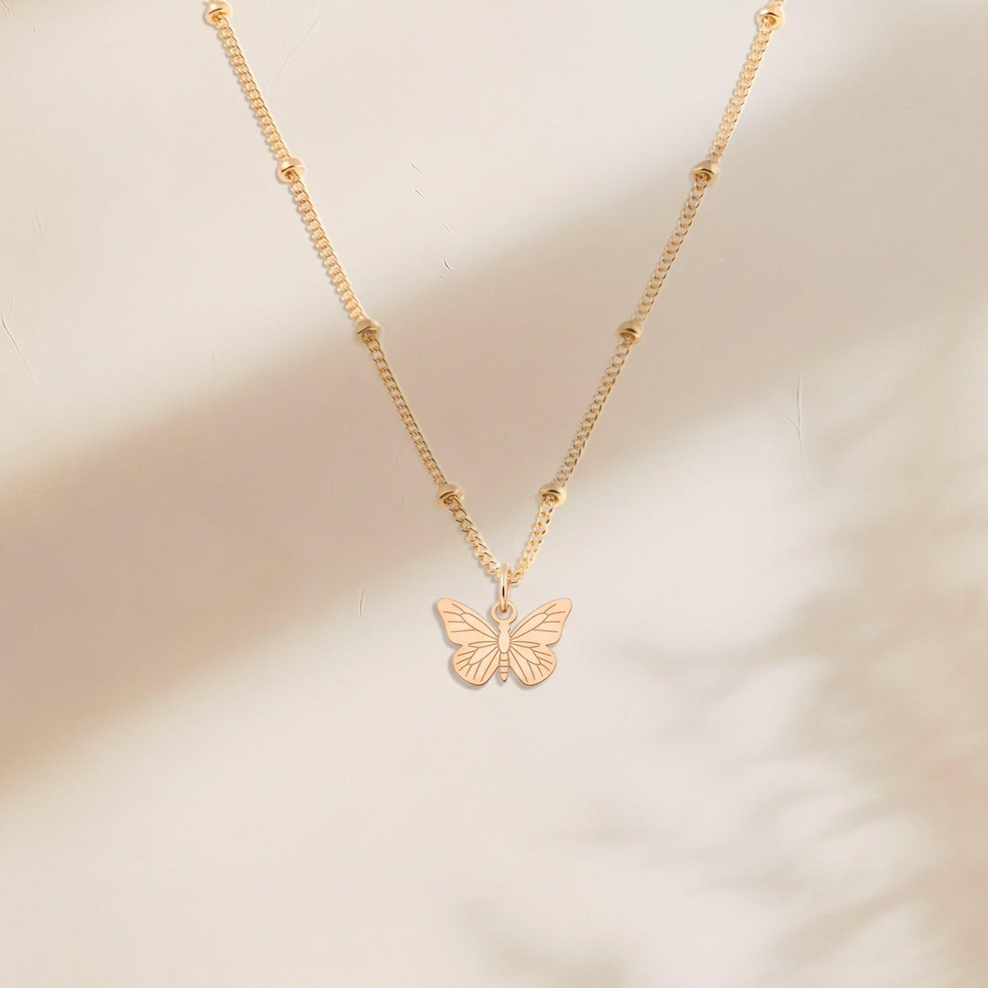 Butterfly Silhouette Charm Beady Necklace
