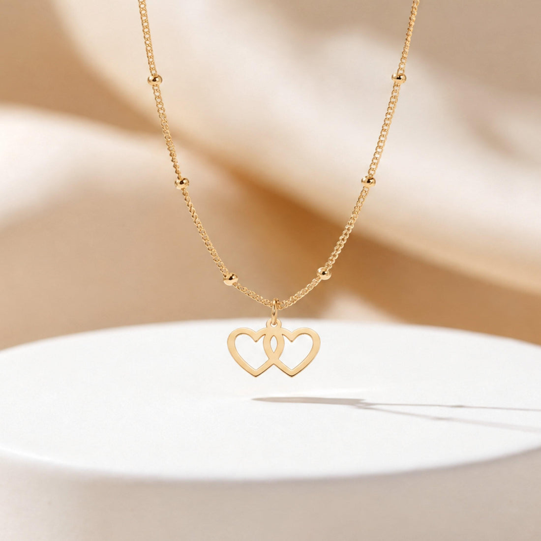 Interlocking Hearts Charm Necklace