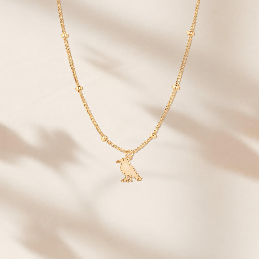 Perched Bird Charm Necklace