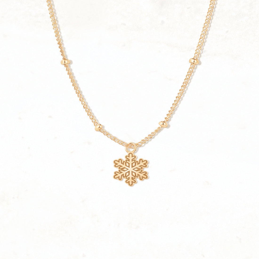 Snowflake Cutout Beady Necklace