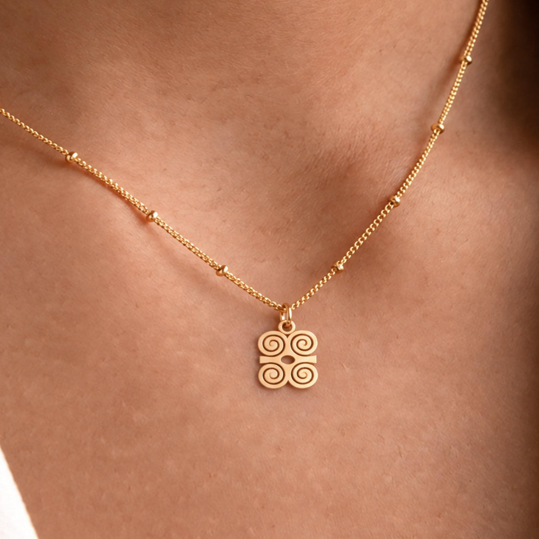 Spiral Knot Charm Necklace