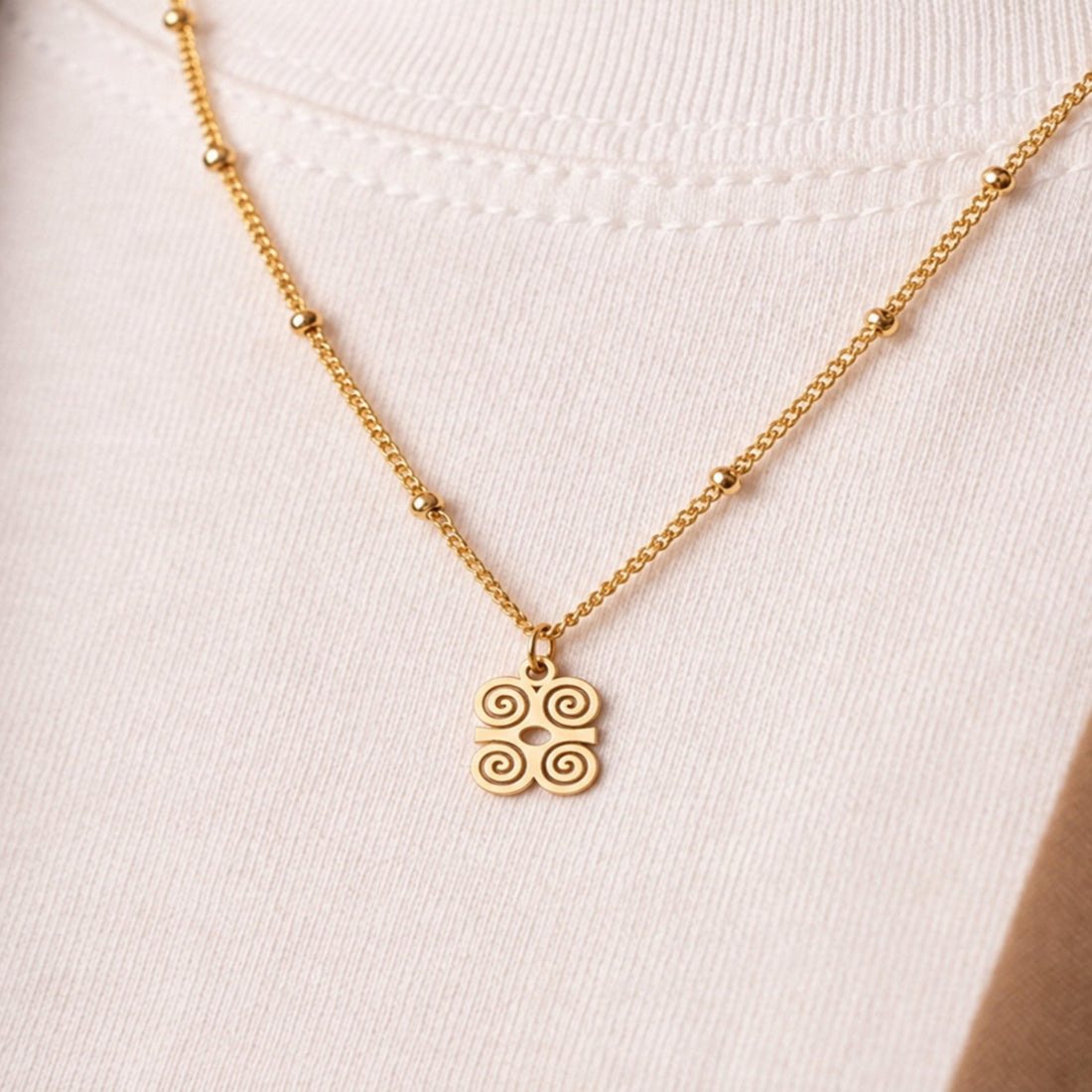 Spiral Knot Charm Necklace