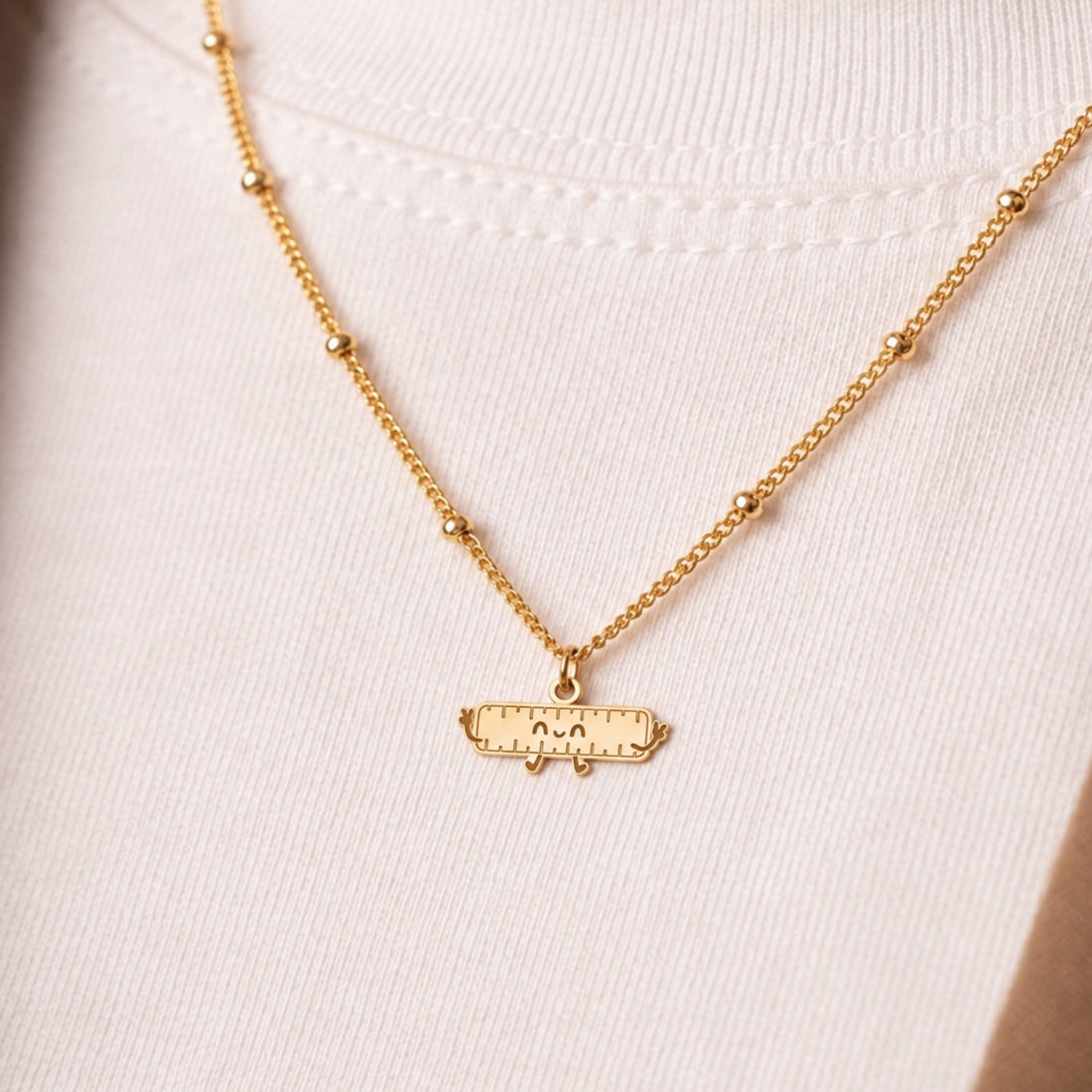 Smiling Ruler Charm Necklace