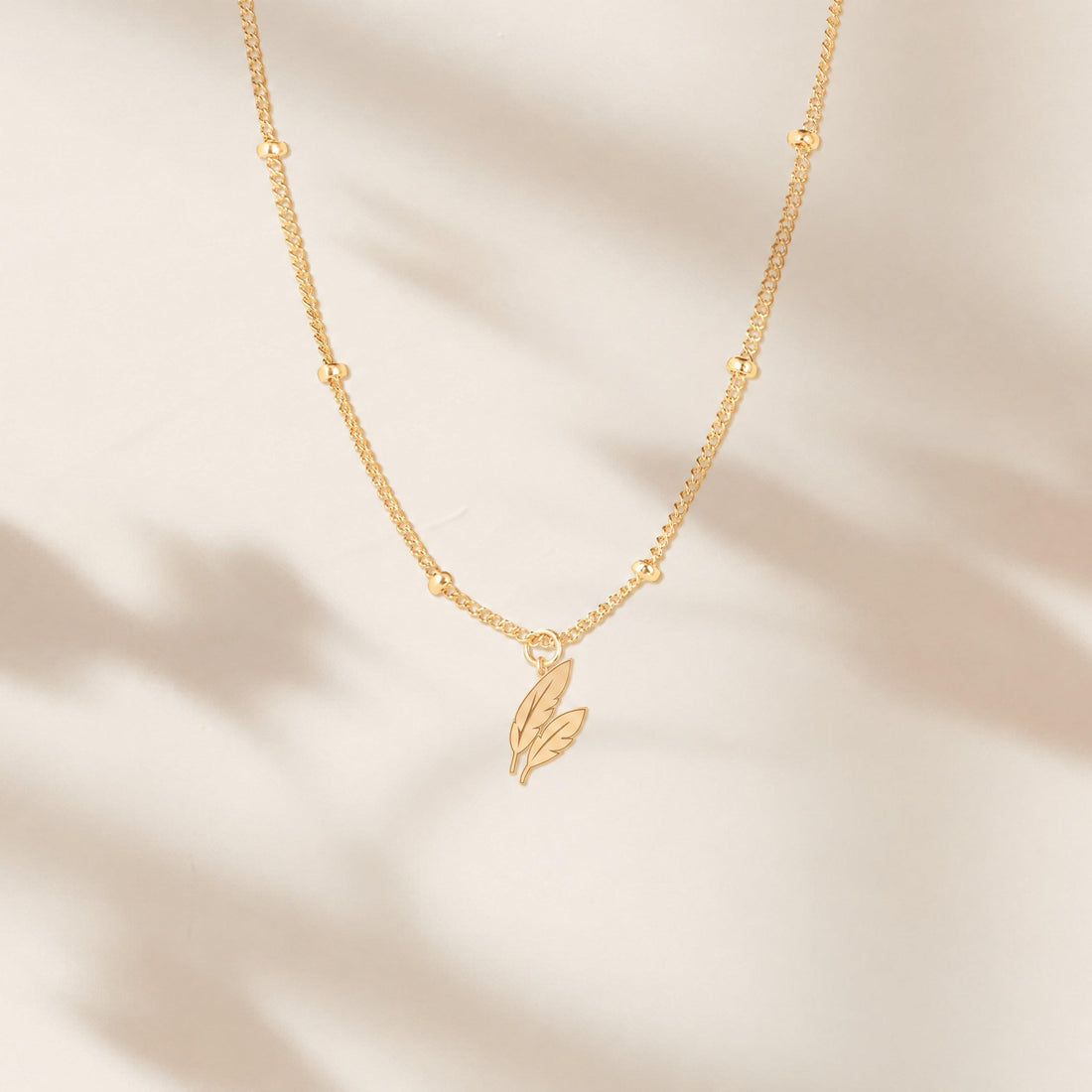 Twin Feathers Charm Necklace